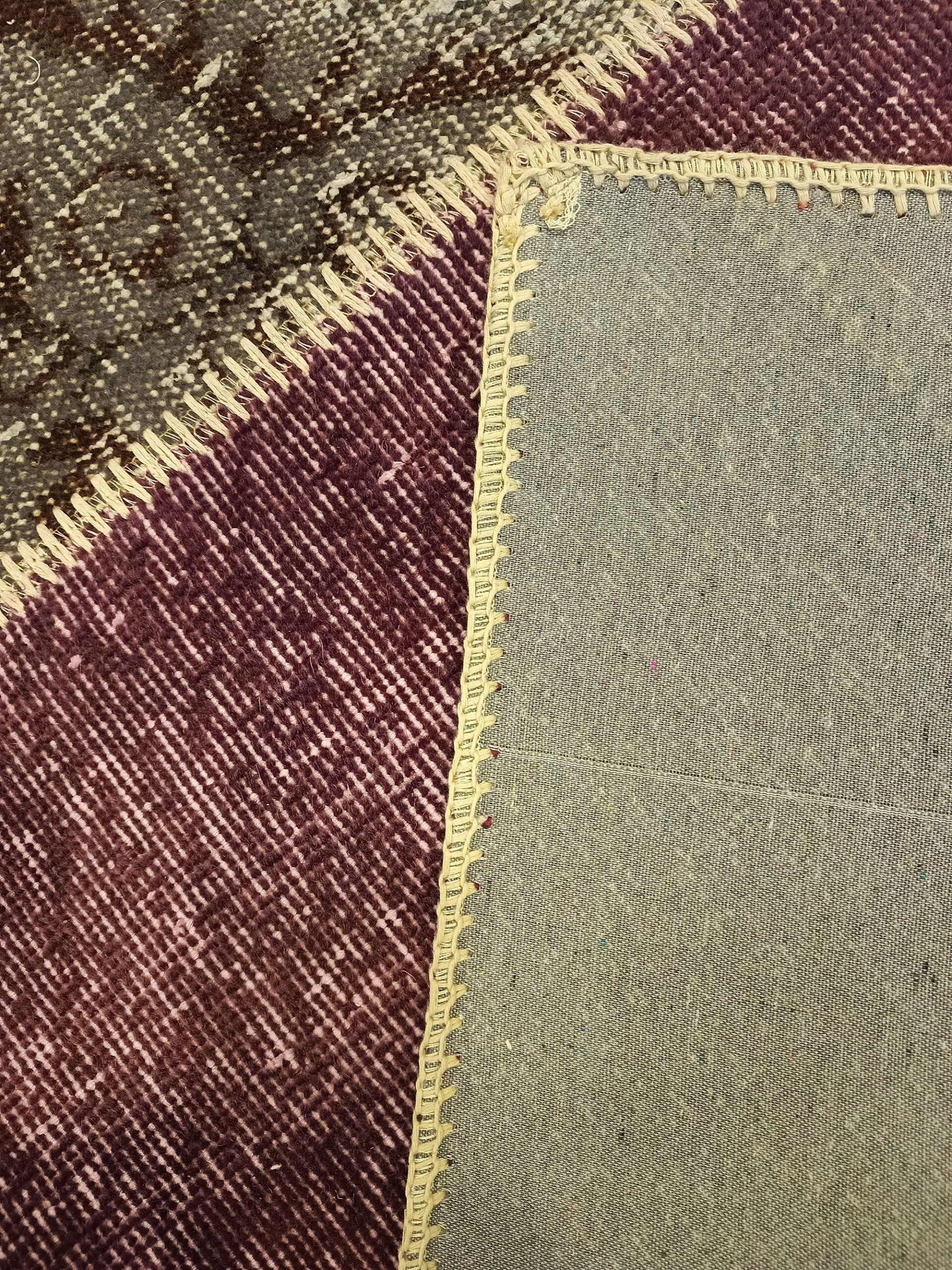Anatolian-Patterned Distressed Patchwork Rug — detail view 3, handmade vintage rug